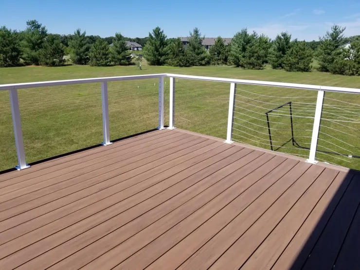 Big Lake 2020 TimberTech Mahogany deck with ADI cable rail - Foremost Construction