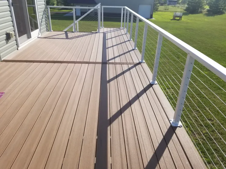 Big Lake 2020 TimberTech Mahogany deck with ADI cable rail - Foremost Construction