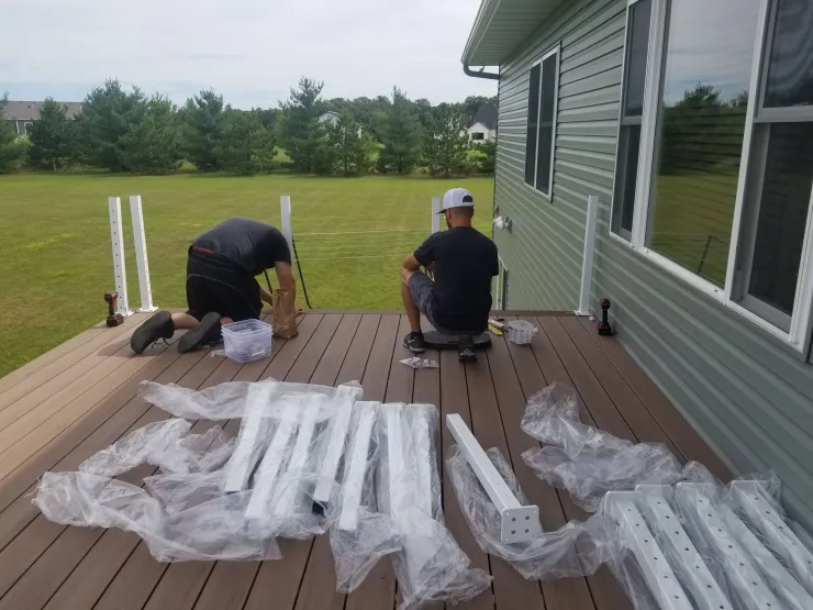 Big Lake 2020 TimberTech Mahogany deck with ADI cable rail - Foremost Construction