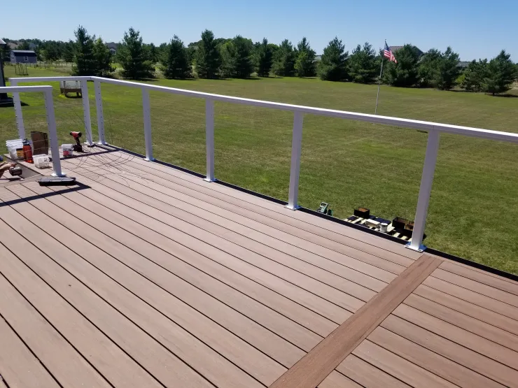 Big Lake 2020 TimberTech Mahogany deck with ADI cable rail - Foremost Construction