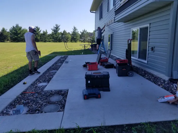 Big Lake 2020 TimberTech Mahogany deck with ADI cable rail - Foremost Construction