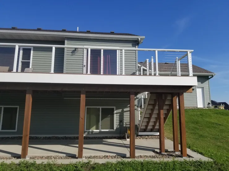Big Lake 2020 TimberTech Mahogany deck with ADI cable rail - Foremost Construction